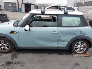 2013 MINI Hardtop with VIN WMWSU3C50DT546031, listed as a IAAI auction lot 42542290 with 119,711 mi miles and . Bid and sale history available at DreamBid. Image 14.