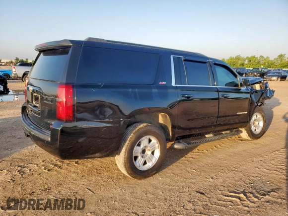 2020 Chevrolet Suburban LT with VIN 1GNSKHKC9LR102624, listed as a Copart auction lot 58970995 with 76,132 mi miles and Salvage title. Bid and sale history available at DreamBid. Image 3.