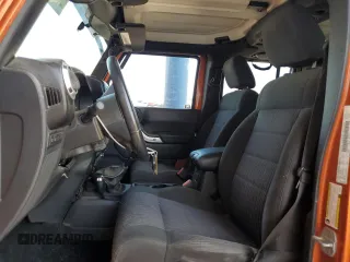 2011 Jeep Wrangler Unlimited Rubicon with VIN 1J4BA6H13BL538385, listed as a Copart auction lot 64080075 with 90,459 mi miles and Salvage title. Bid and sale history available at DreamBid. Image 7.