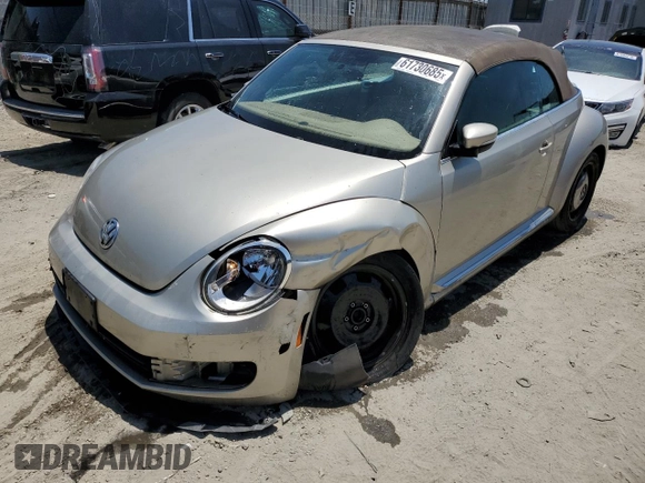2014 Volkswagen Beetle 1.8T with VIN 3VW517AT9EM820812, listed as a Copart auction lot 61730685 with 85,571 mi miles and Clean title. Bid and sale history available at DreamBid. Image 1.