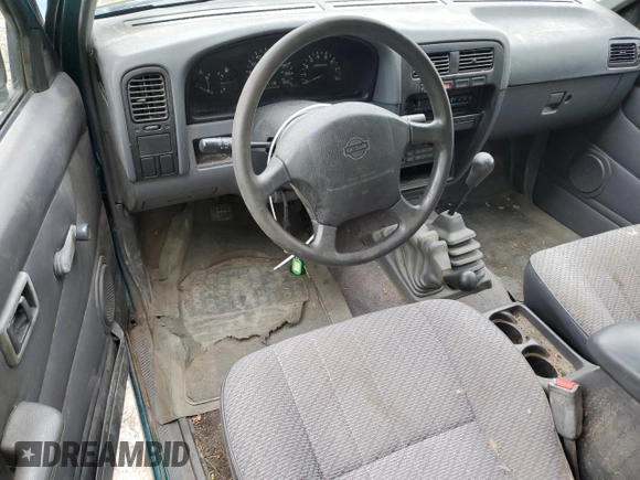 1997 Nissan Frontier XE with VIN 1N6SD16Y0VC329686, listed as a Copart auction lot 73103584 with 105,657 mi miles and Salvage title. Bid and sale history available at DreamBid. Image 8.
