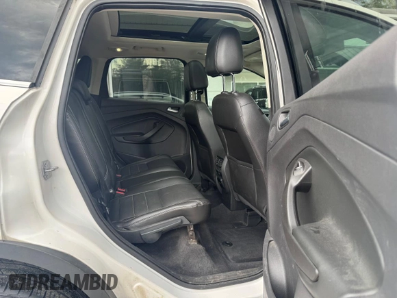 2014 Ford Escape Titanium with VIN 1FMCU9J94EUC63638, listed as a Copart auction lot 55880505 with 198,112 mi miles and Clean Title. Bid and sale history available at DreamBid. Image 6.