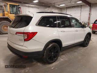 2021 Honda Pilot Special Edition with VIN 5FNYF6H2XMB054312, listed as a IAAI auction lot 41828508 with 115,652 mi miles and . Bid and sale history available at DreamBid. Image 4.