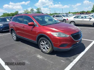 2014 Mazda CX-9 Touring with VIN JM3TB2CA7E0427214, listed as a IAAI auction lot 42175140 with 182,091 mi miles and . Bid and sale history available at carsss.com. Image 1.