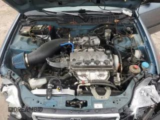 1997 Honda Civic LX z VIN 2HGEJ6676VH507855, wystawiony jako Copart lot #56684455 z przebiegiem 185 498 mil mil oraz Szkoda całkowita • Salvage title. Historia ofert i sprzedaży dostępna na DreamBid. Obrazek 11.