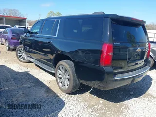 2019 Chevrolet Suburban LT with VIN 1GNSCJKC5KR360318, listed as a IAAI auction lot 41504344 with 82,997 mi miles and . Bid and sale history available at DreamBid. Image 3.