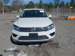 2016 Volkswagen Touareg Sport with VIN WVGEF9BP5GD012680, listed as a IAAI auction lot 41610943 with 153,952 mi miles and . Bid and sale history available at DreamBid. Image 12.