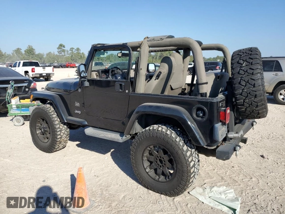 2004 Jeep Wrangler Sahara with VIN 1J4FA59S04P772756, listed as a Copart auction lot 47973495 with 92,685 mi miles and Salvage Title. Bid and sale history available at DreamBid. Image 2.
