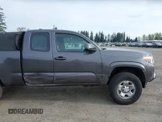 2018 Toyota Tacoma SR z VIN 5TFSX5EN0JX062612, wystawiony jako IAAI lot #41993211 z przebiegiem 92 586 mil mil oraz . Historia ofert i sprzedaży dostępna na DreamBid. Obrazek 6.