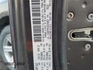 2014 Ram 1500 Longhorn with VIN 1C6RR7PMXES370857, listed as a Copart auction lot 69699954 with 105,590 mi miles and Salvage title. Bid and sale history available at DreamBid. Image 12.