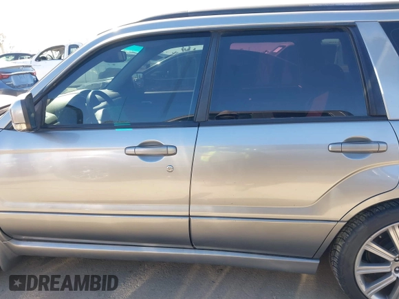 2007 Subaru Forester Sports XT with VIN JF1SG69687H733459, listed as a IAAI auction lot 41827464 with 139,943 mi miles. Bid and sale history available at carsss.com. Image 14.