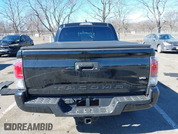 2021 Toyota Tacoma 4WD SR5 with VIN 3TMDZ5BN4MM117564, listed as a IAAI auction lot 41629220 with 77,063 mi miles. Bid and sale history available at carsss.com. Image 17.