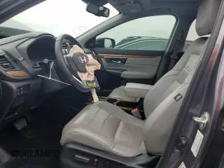 2020 Honda CR-V Touring z VIN 7FARW1H95LE002254, wystawiony jako Copart lot #42535505 z przebiegiem 77 004 mil mil oraz Szkoda całkowita • Salvage title. Historia ofert i sprzedaży dostępna na DreamBid. Obrazek 7.