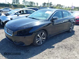 2014 Nissan Maxima S with VIN 1N4AA5AP0EC445232, listed as a IAAI auction lot 42154984 with 91,205 mi miles and . Bid and sale history available at DreamBid. Image 2.