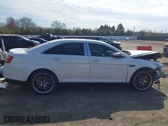 2015 Ford Taurus SEL z VIN 1FAHP2E86FG202386, wystawiony jako IAAI lot #42061925 z przebiegiem 123 475 mil mil oraz . Historia ofert i sprzedaży dostępna na DreamBid. Obrazek 14.