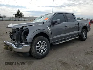 2022 Ford F-150 XL with VIN 1FTEW1EP7NKD37244, listed as a Copart auction lot 50974555 with 23,906 mi miles and Salvage Title. Bid and sale history available at carsss.com. Image 1.
