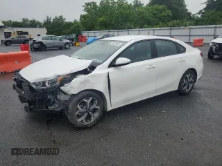 2021 Kia Forte LXS with VIN 3KPF24AD0ME386140, listed as a Copart auction lot 60263065 with 57,242 mi miles and Salvage title. Bid and sale history available at DreamBid. Image 1.