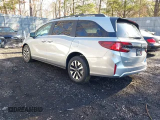 2025 Honda Odyssey EX-L with VIN 5FNRL6H64SB016104, listed as a IAAI auction lot 41456550 with 61 mi miles and . Bid and sale history available at DreamBid. Image 3.