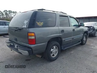 2002 Chevrolet Tahoe LS with VIN 1GNEC13VX2R156255, listed as a IAAI auction lot 41376768 with 246,305 mi miles. Bid and sale history available at carsss.com. Image 4.