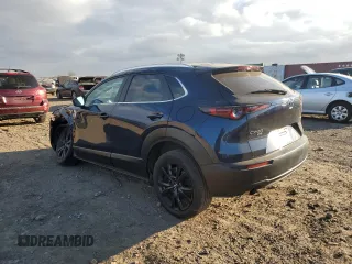2022 Mazda CX-30 2.5 Turbo with VIN 3MVDMBAY8NM459690, listed as a Copart auction lot 84376874 with 24,723 mi miles and Salvage Title. Bid and sale history available at DreamBid. Image 2.