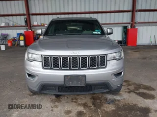 2018 Jeep Grand Cherokee Laredo E with VIN 1C4RJFAG7JC130313, listed as a IAAI auction lot 41969759 with 177,017 mi miles and . Bid and sale history available at DreamBid. Image 12.