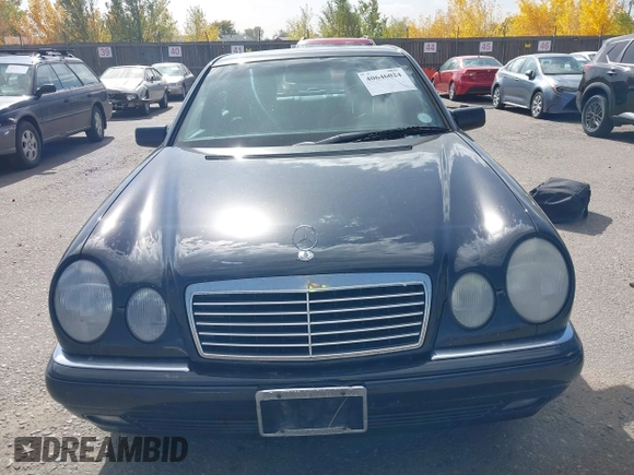 1998 Mercedes-Benz E-Class with VIN WDBJF65F0WA476690, listed as a IAAI auction lot 40646024 with 199,593 mi miles. Bid and sale history available at carsss.com. Image 6.