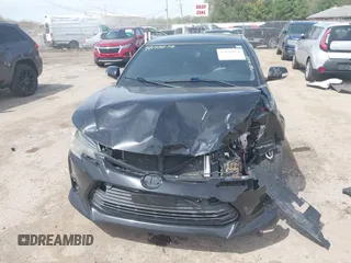 2015 Scion tC z VIN JTKJF5C75FJ012021, wystawiony jako IAAI lot #42143878 z przebiegiem 127 235 mil mil oraz . Historia ofert i sprzedaży dostępna na DreamBid. Obrazek 11.