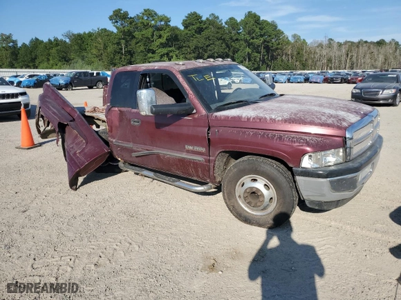 2001 Dodge Ram 3500 with VIN 1B7MC33671J502249, listed as a Copart auction lot 67999974 with 0 mi miles and Salvage Title. Bid and sale history available at carsss.com. Image 4.