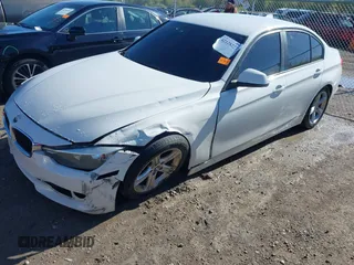 2015 BMW 3 Series 320i with VIN WBA3B1G57FNT02019, listed as a IAAI auction lot 42128277 with 218,621 mi miles and . Bid and sale history available at DreamBid. Image 6.