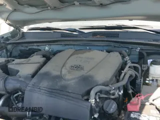 2022 Toyota Tacoma SR5 z VIN 3TYDZ5BNXNT015367, wystawiony jako IAAI lot #42257523 z przebiegiem 46 301 mil mil oraz . Historia ofert i sprzedaży dostępna na DreamBid. Obrazek 21.