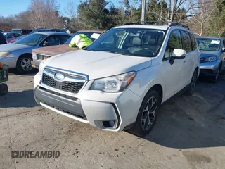 2014 Subaru Forester XT Touring with VIN JF2SJGPC9EH417920, listed as a IAAI auction lot 41270689 with 184,976 mi miles and . Bid and sale history available at DreamBid. Image 2.
