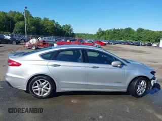 2019 Ford Fusion Titanium with VIN 3FA6P0RUXKR141565, listed as a IAAI auction lot 42323999 with 206,397 mi miles and . Bid and sale history available at DreamBid. Image 14.