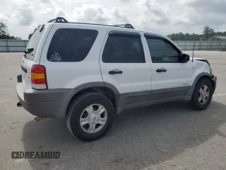 2002 Ford Escape XLT Choice with VIN 1FMYU04172KA40489, listed as a Copart auction lot 58437165 with 212,793 mi miles and Salvage title. Bid and sale history available at DreamBid. Image 3.