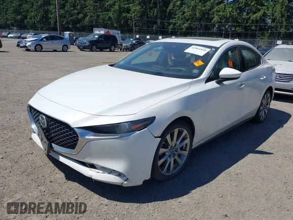 2021 Mazda 3 with VIN JM1BPBDL6M1340029, listed as a IAAI auction lot 42461850 with 79,798 mi miles and . Bid and sale history available at DreamBid. Image 6.