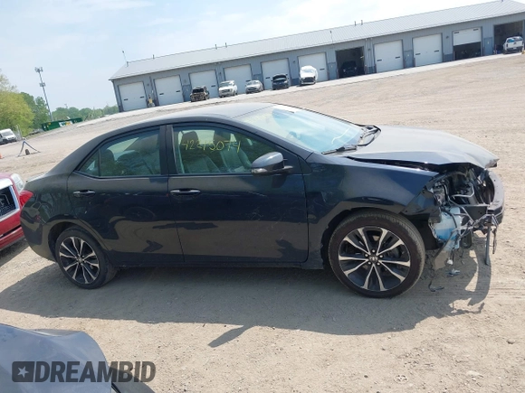 2018 Toyota Corolla L with VIN 2T1BURHE1JC111066, listed as a IAAI auction lot 42215074 with 106,677 mi miles and . Bid and sale history available at DreamBid. Image 14.