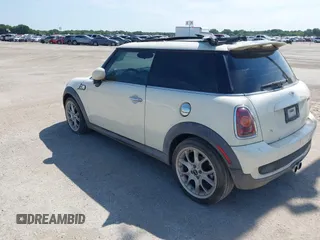 2007 MINI Hardtop S with VIN WMWMF73517TL83792, listed as a IAAI auction lot 42680017 with 135,631 mi miles and . Bid and sale history available at DreamBid. Image 3.
