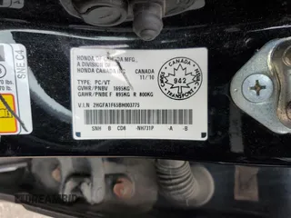 2011 Honda Civic LX-S z VIN 2HGFA1F65BH003775, wystawiony jako Copart lot #56134845 z przebiegiem Nie podano mil oraz Szkoda całkowita • Salvage title. Historia ofert i sprzedaży dostępna na DreamBid. Obrazek 12.