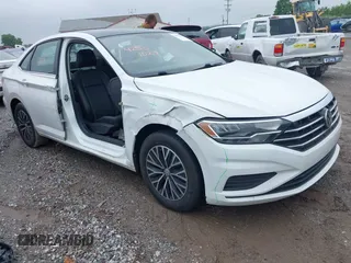 2019 Volkswagen Jetta S z VIN 3VWC57BUXKM068052, wystawiony jako IAAI lot #42531029 z przebiegiem 65 273 mil mil oraz . Historia ofert i sprzedaży dostępna na DreamBid. Obrazek 1.