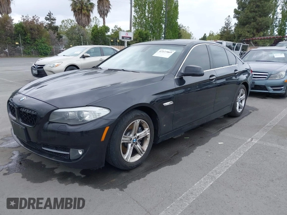 2012 BMW 5 Series 528i with VIN WBAXG5C55CDX02405, listed as a IAAI auction lot 42127069 with 155,764 mi miles. Bid and sale history available at carsss.com. Image 6.