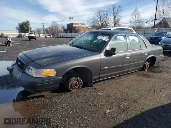 2004 Ford Police Interceptor Base w/3.27 Axle with VIN 2FAFP71W54X126756, listed as a Copart auction lot 50311705 with 135,654 mi miles and Salvage title. Bid and sale history available at DreamBid. Image 1.