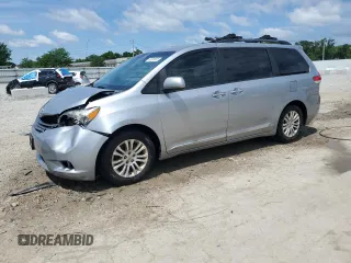 2014 Toyota Sienna XLE с VIN 5TDYK3DC7ES462515, выставлен на аукционе Copart как лот 63008685 с пробегом 235 152 миль миль и Списание • Salvage title. История ставок и продаж доступна на DreamBid. Изображение 1.