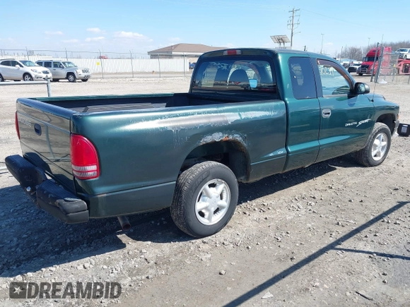 1999 Dodge Dakota SLT z VIN 1B7GL22X0XS128071, wystawiony jako IAAI lot #42010239 z przebiegiem 150 495 mil mil oraz . Historia ofert i sprzedaży dostępna na DreamBid. Obrazek 4.