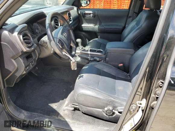 2018 Toyota Tacoma SR5 with VIN 3TMAZ5CN0JM058283, listed as a Copart auction lot 53863265 with 135,562 mi miles and Salvage Title. Bid and sale history available at DreamBid. Image 7.