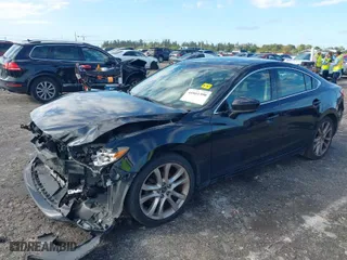 2017 Mazda Mazda6 Touring with VIN JM1GL1V52H1128973, listed as a IAAI auction lot 41661300 with 131,721 mi miles. Bid and sale history available at carsss.com. Image 2.