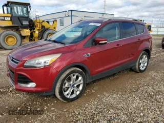 2016 Ford Escape Titanium z VIN 1FMCU9J94GUA00665, wystawiony jako Copart lot #57960885 z przebiegiem 91 093 mil mil oraz Szkoda całkowita • Salvage title. Historia ofert i sprzedaży dostępna na DreamBid. Obrazek 1.