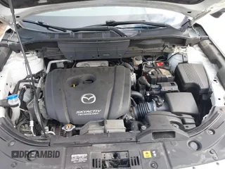 2018 Mazda CX-5 Grand Touring with VIN JM3KFBDM0J0308813, listed as a IAAI auction lot 42657978 with 78,119 mi miles and . Bid and sale history available at DreamBid. Image 10.