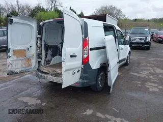 2014 Ford Transit Connect XL with VIN NM0LS7E7XE1172489, listed as a IAAI auction lot 41948145 with 101,953 mi miles and . Bid and sale history available at DreamBid. Image 4.