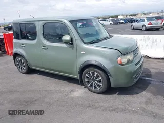 2010 Nissan Cube S z VIN JN8AZ2KR5AT154015, wystawiony jako IAAI lot #42201533 z przebiegiem 150 701 mil mil oraz . Historia ofert i sprzedaży dostępna na DreamBid. Obrazek 1.