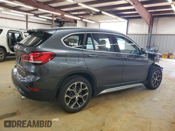 2021 BMW X1 xDrive28i with VIN WBXJG9C00M5S35249, listed as a Copart auction lot 61895775 with 34,641 mi miles and Salvage title. Bid and sale history available at DreamBid. Image 3.