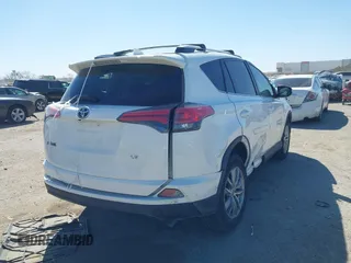 2016 Toyota RAV4 LE with VIN 2T3ZFREV2GW291072, listed as a IAAI auction lot 41831444 with 135,820 mi miles. Bid and sale history available at carsss.com. Image 4.